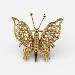 Vintage Monet Elegant Gold tone filigree Butterfly Brooch in excellent condition